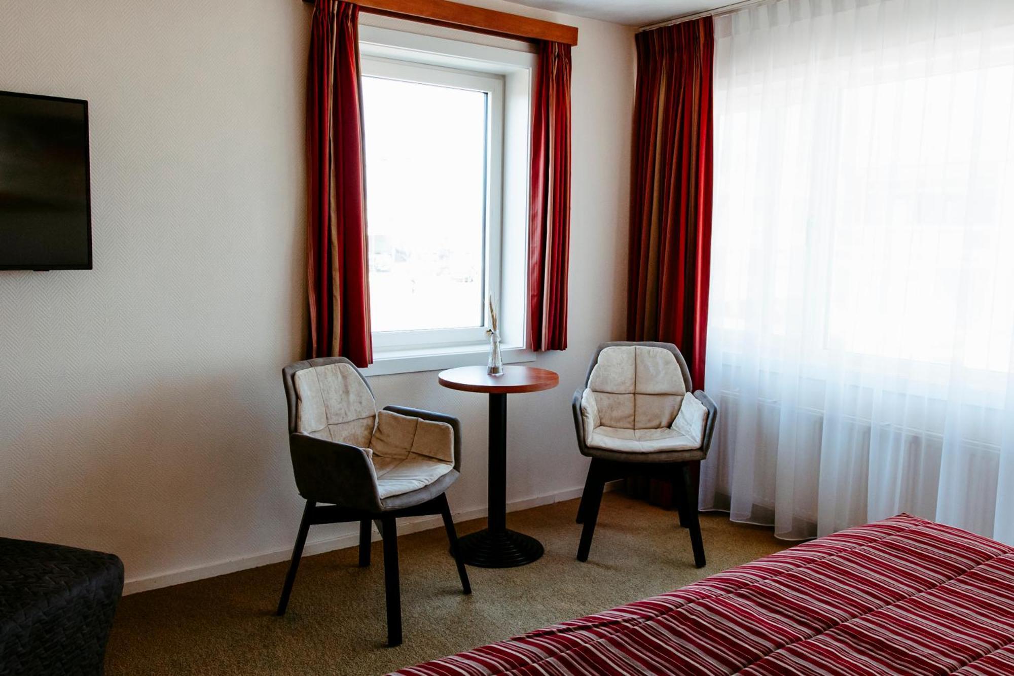 Hotel Victoria Bergen aan Zee Rom bilde